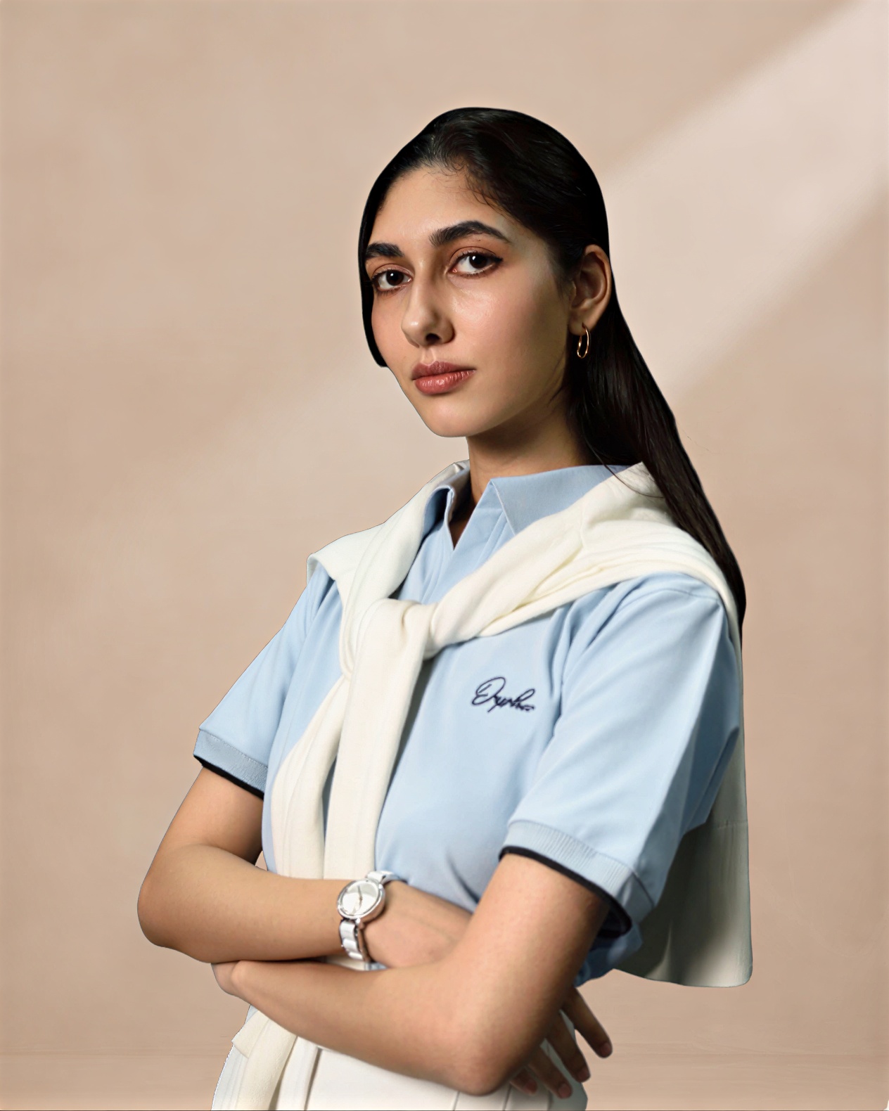 Women's sky blue piqué polo, angled view