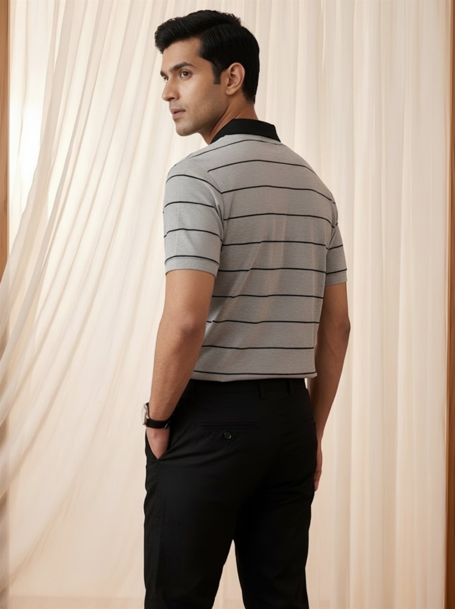 Orphic men's grey striped polo with black contrast collar, over-the-shoulder view
