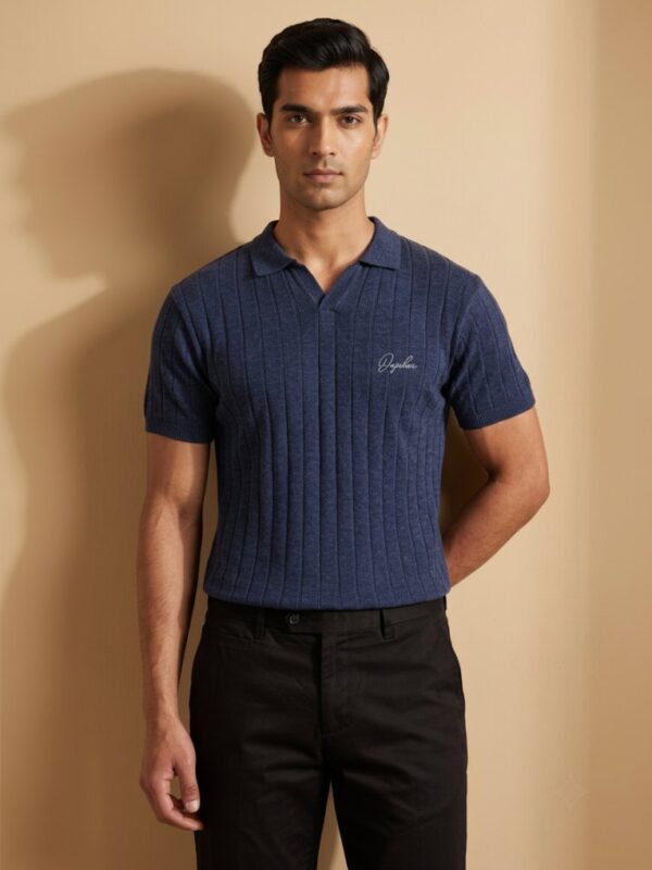 Model wearing Orphic men's indigo ribbed-knit polo with open collar, front view