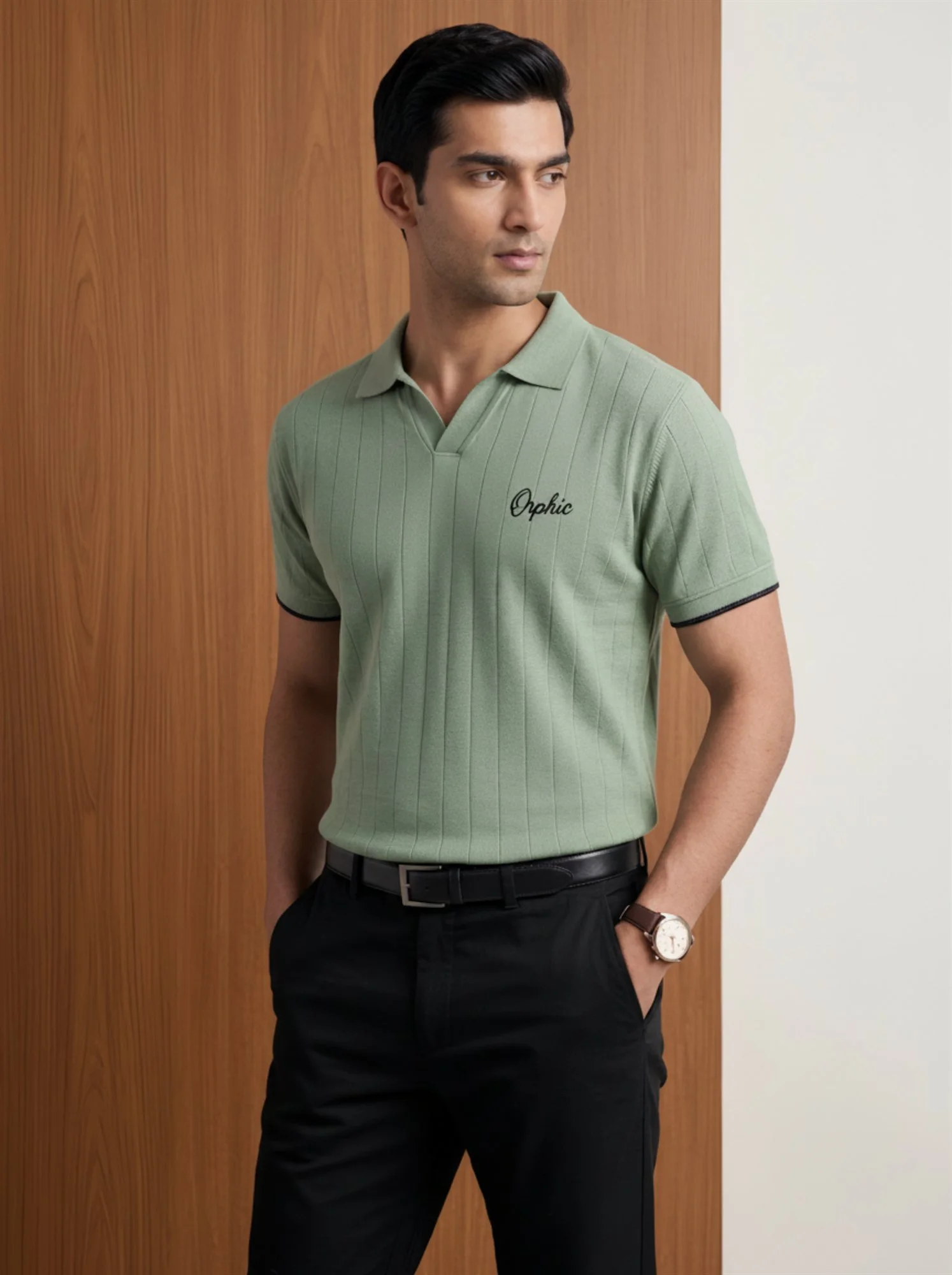 Men's sage green ribbed polo with black-tipped cuffs, three-quarter view