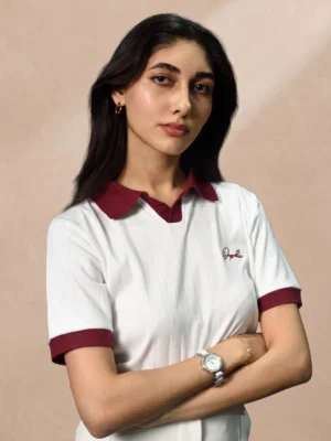 Women's white drop needle polo, front view