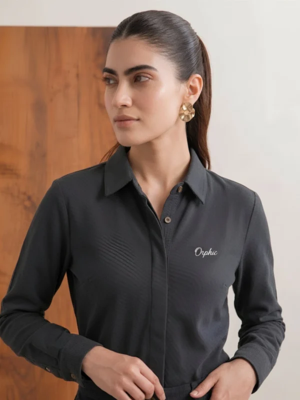 Women's charcoal knit shirt angled view showing button placket