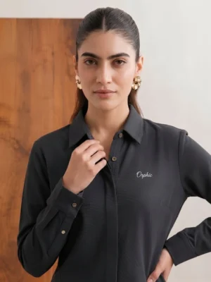 Women's charcoal knit shirt front view with collar and cream Orphic embroidery